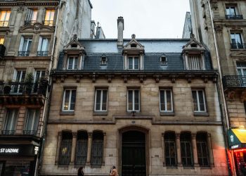 Elegant Parisian Corner Building at Dusk
